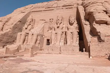 Abu Simbel, an ancient tomb carved on the stone with statues in Egypt