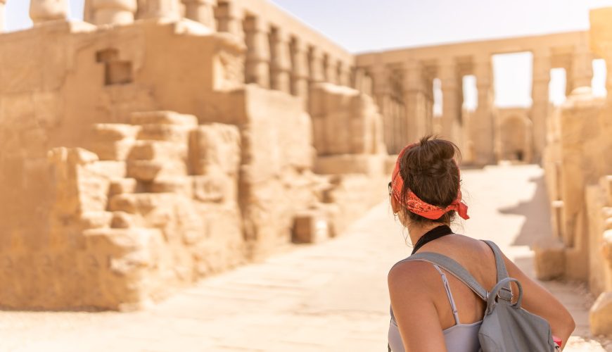 Tourist gazing an ancient egyptian temple in Luxor