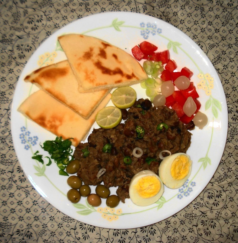 A bowl of ful medames with olive oil