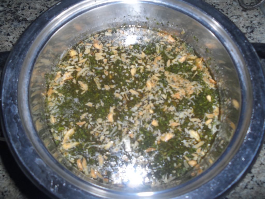 A bowl of green molokhia soup