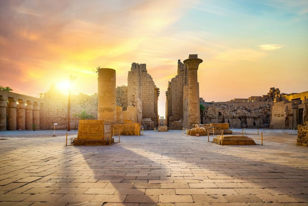 The ruins of Karnak Temple glowing in the evening sun
