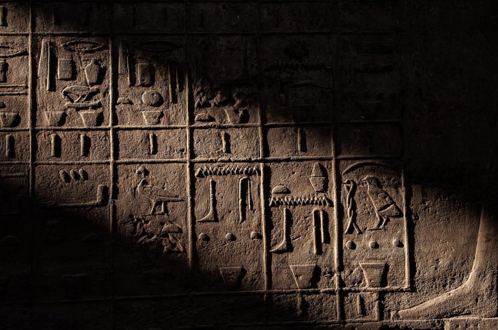 Hieroglyphs carved into a wall at Karnak Temple