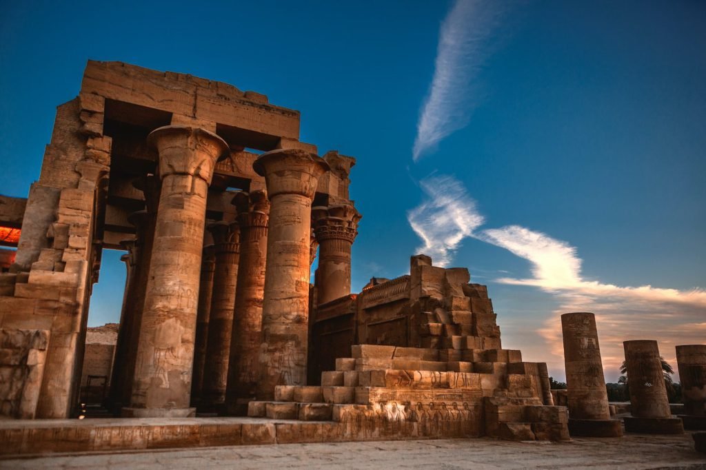 The standing columns of Kom Ombo temple in warm evening light