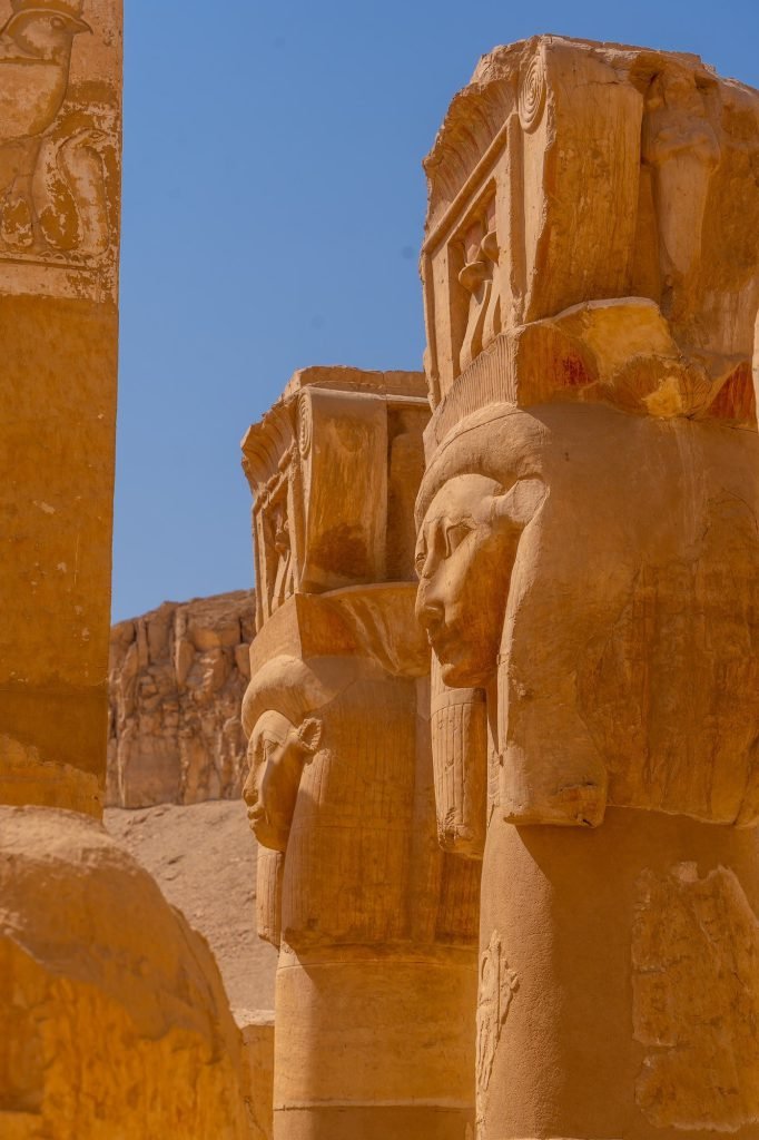 Carved heads of the goddess Hathor on the pillars of Hatshepsut's temple