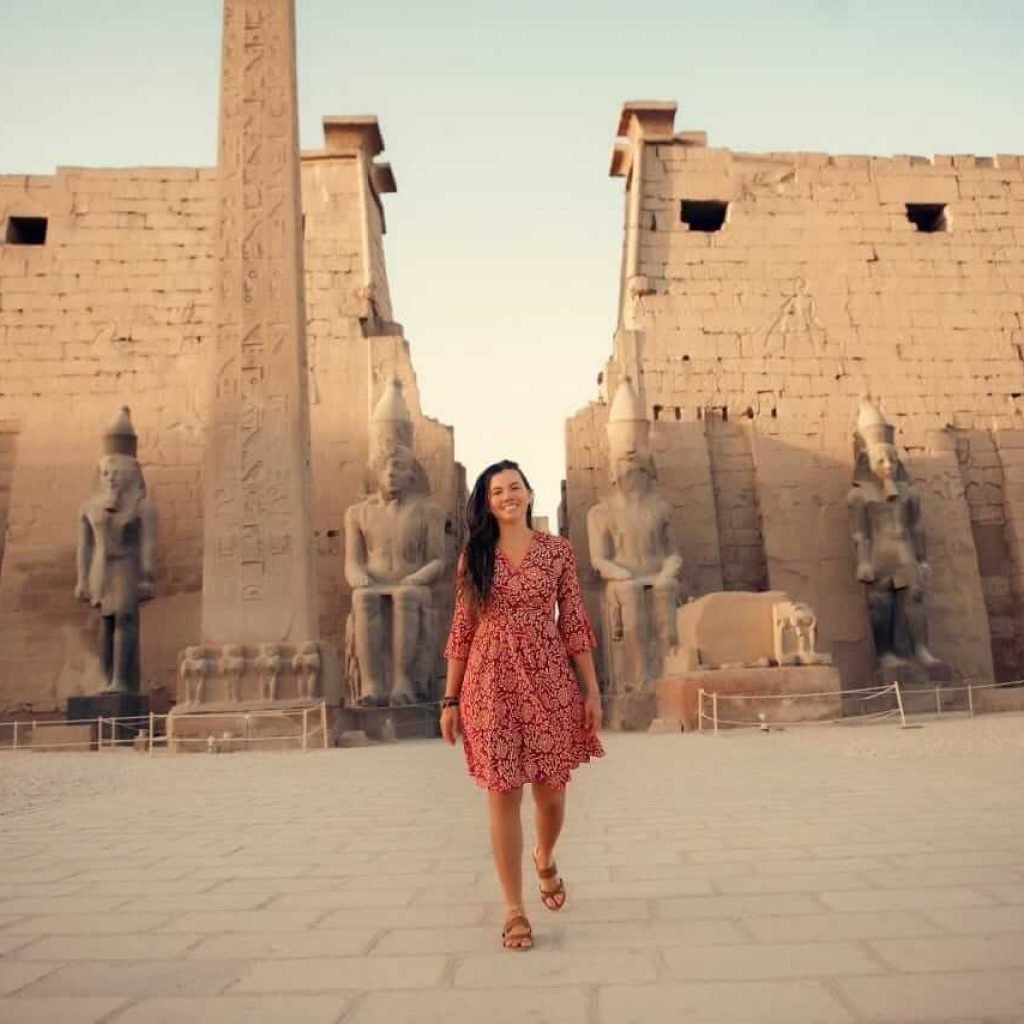 Luxor East Bank private transfer – a traveler at the entrance pylon of Luxor Temple
