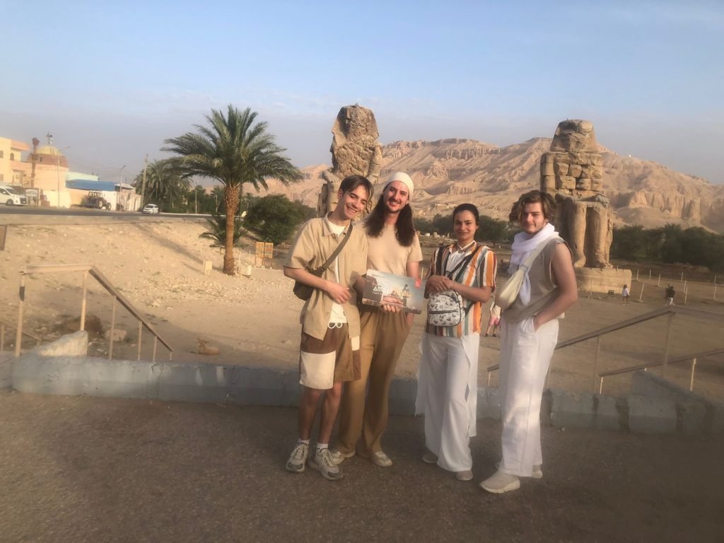 Amwaj travelers with their guide at the Colossi of Memnon on Luxor's West Bank