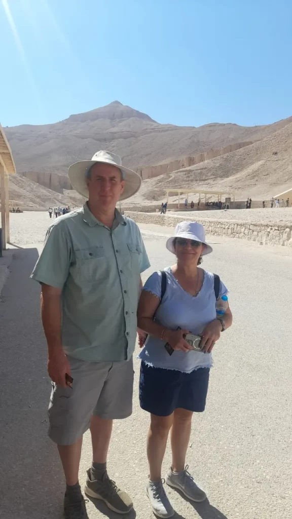 Two travelers standing in the Valley of the Kings