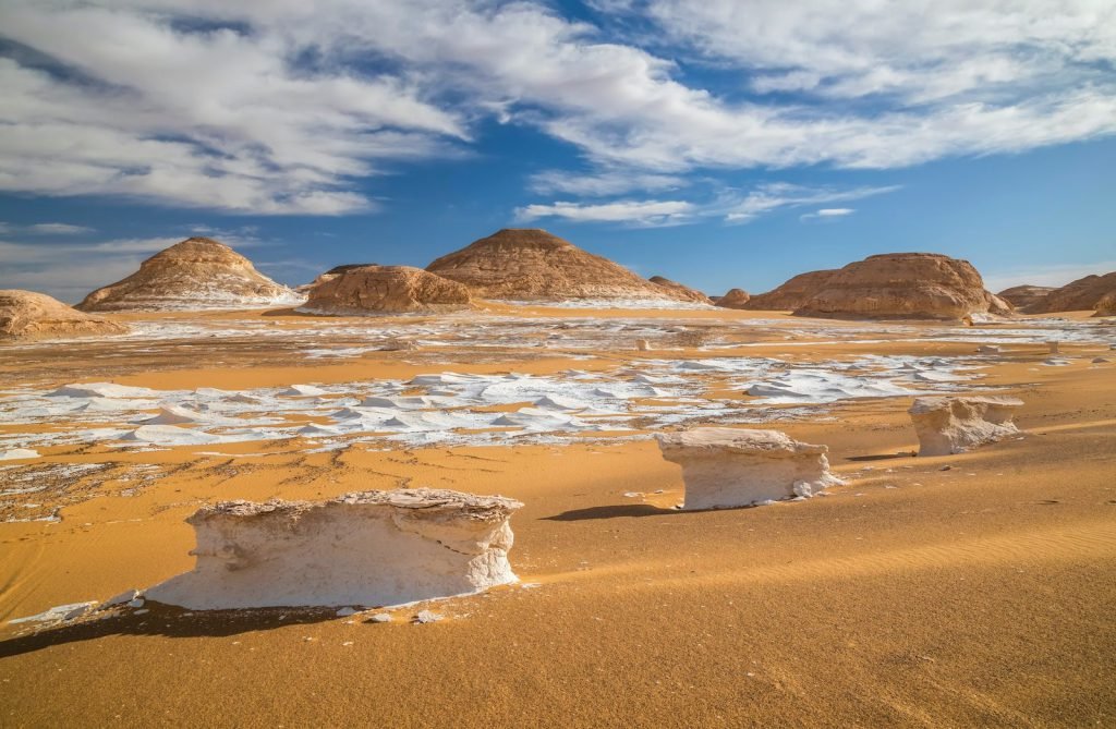 Bahariya Oasis tours – white chalk rocks and golden sand in the White Desert near Bahariya